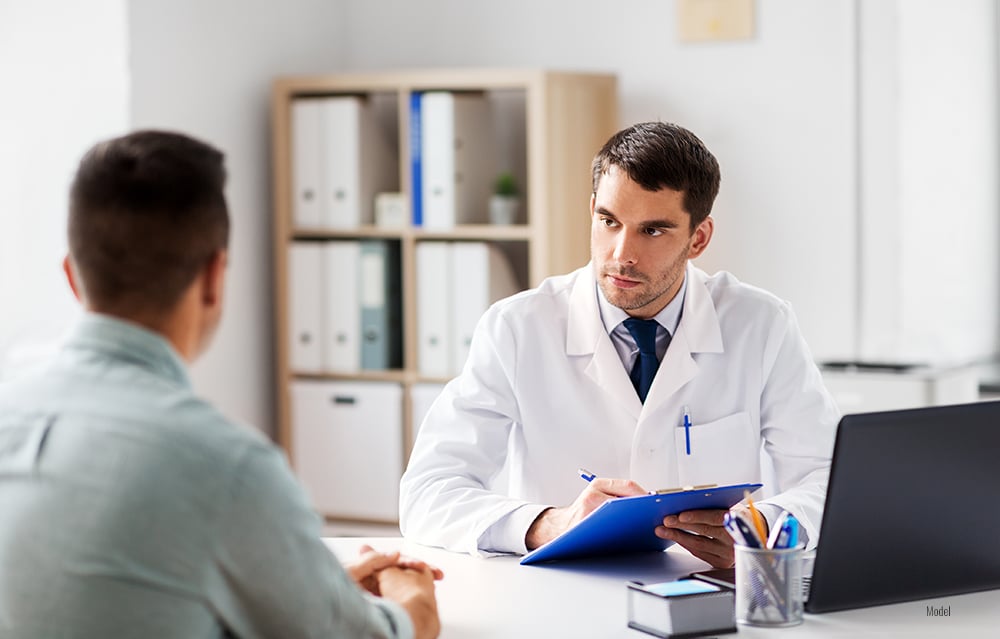 Image of a patient preparing for gynecomastia surgery with pre-surgery instructions.
